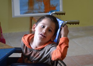 Image of Brandon a child at Centro Sigamos with cerebral palsy