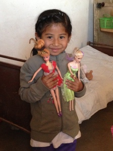 Norma's daughter, Isabel, age 5, was eager to show us her favorite dolls